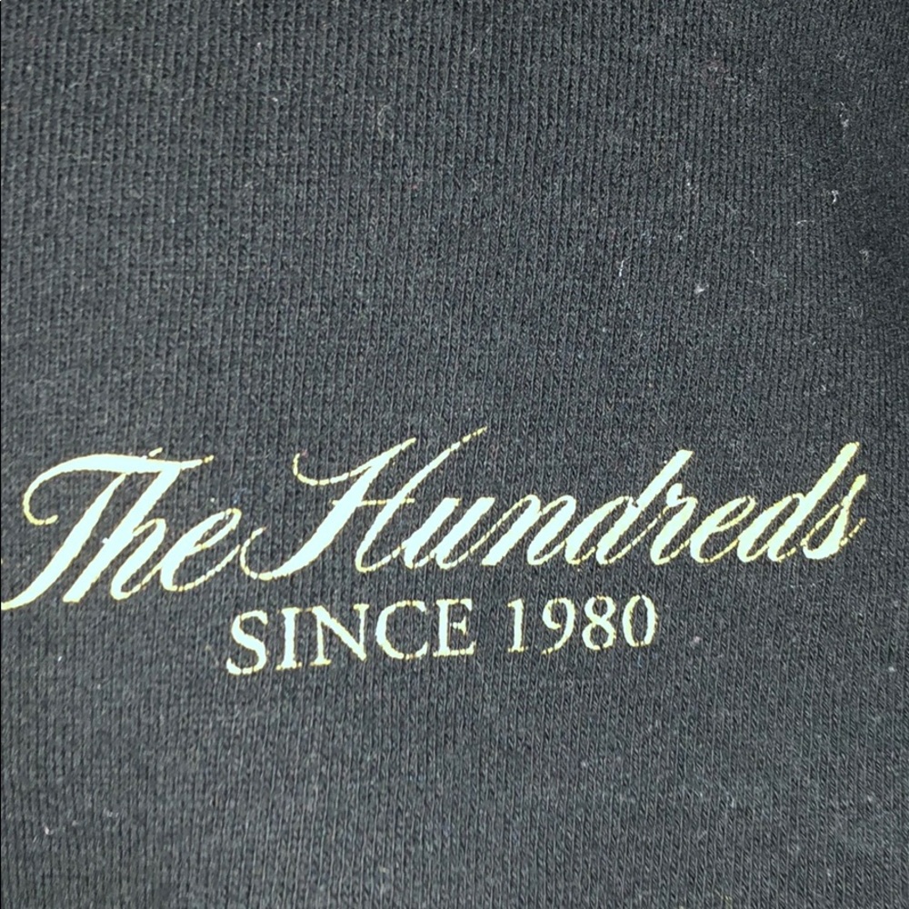 Black “the hundredths” hoodie